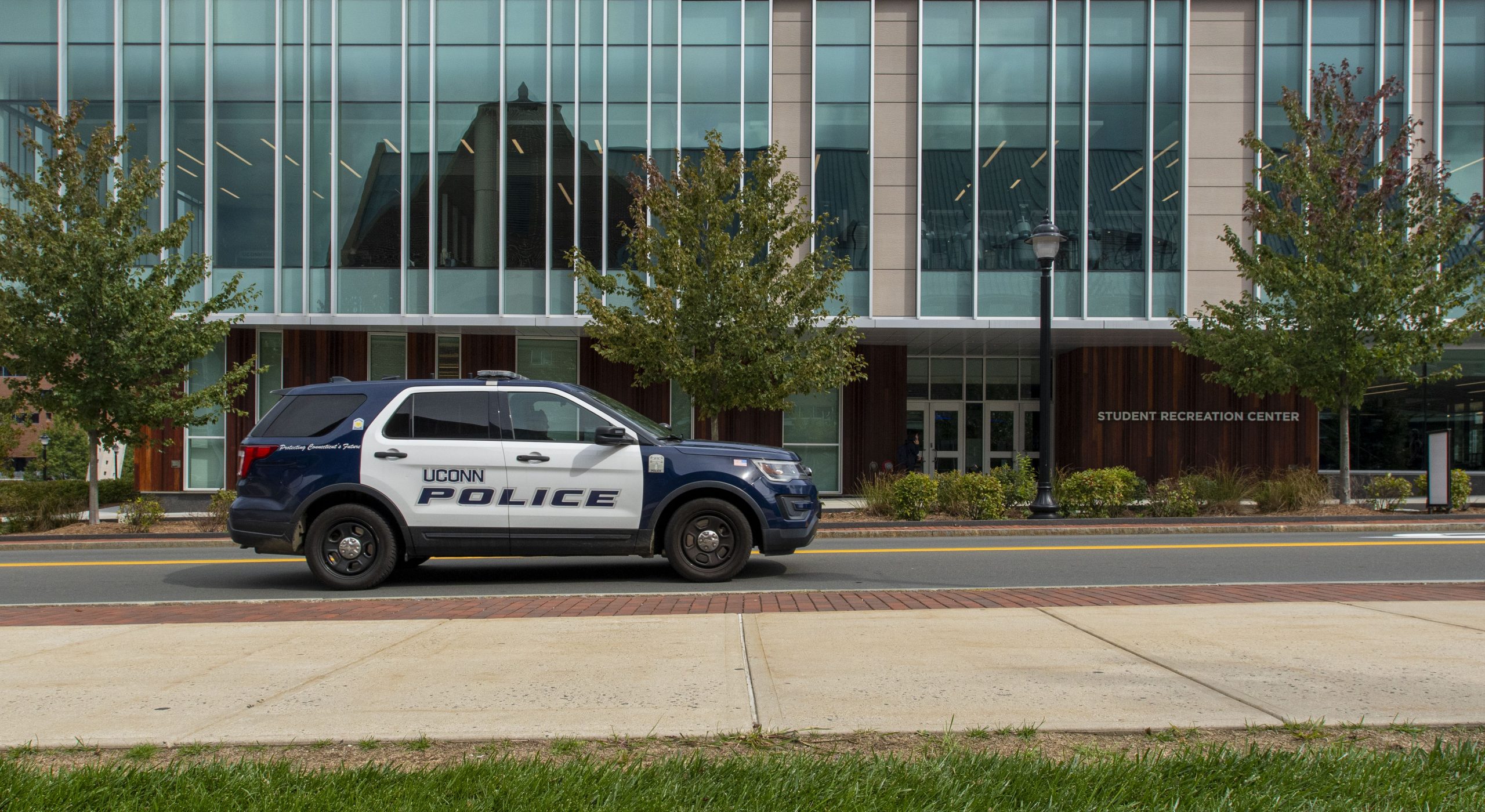 A UConn Police vehicle drives past the Student Recreation Center on the main campus in Storrs